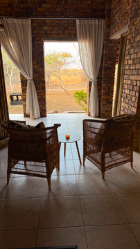 Kruger Riverside Lodge, Marloth Park, DCC Hotel Group, bush view patio, outdoor seating area, peaceful nature escape