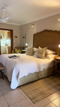 Kruger Riverside Lodge, Marloth Park, DCC Hotel Group, king-size bed, stylish interior design, relaxing retreat