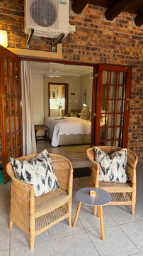 Kruger Riverside Lodge, Marloth Park, DCC Hotel Group, private patio seating, indoor-outdoor living