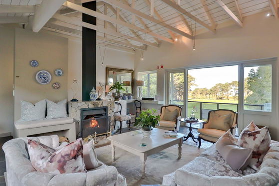 Fireplace with golf course view, Hermanus, Lodge on the Green, Whale Coast Hotel, DCC Hotel Group