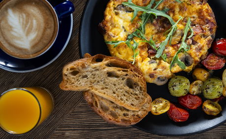 Frittata; Fluffy Eggs with Gouda and Rocket, Roasted Tomatoes, and Bruschetta