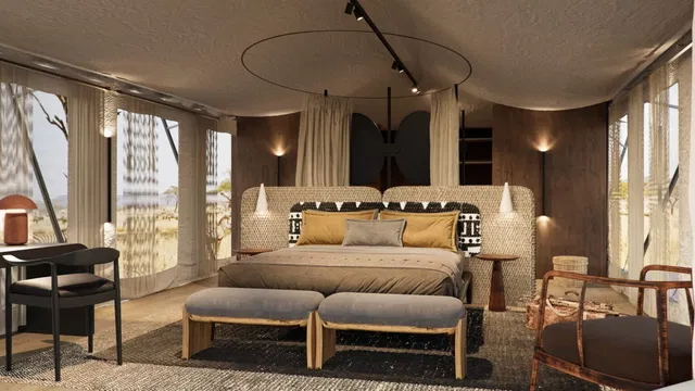 Relax in a cozy bedroom, where comfortable furniture and thoughtfully designed elements create a welcoming atmosphere perfect for unwinding after a safari adventure.