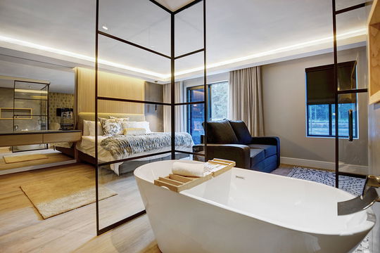 Experience the perfect blend of comfort and sophistication at Hawthorn Boutique, with thoughtfully designed bedrooms featuring large beds and stylish furnishings.