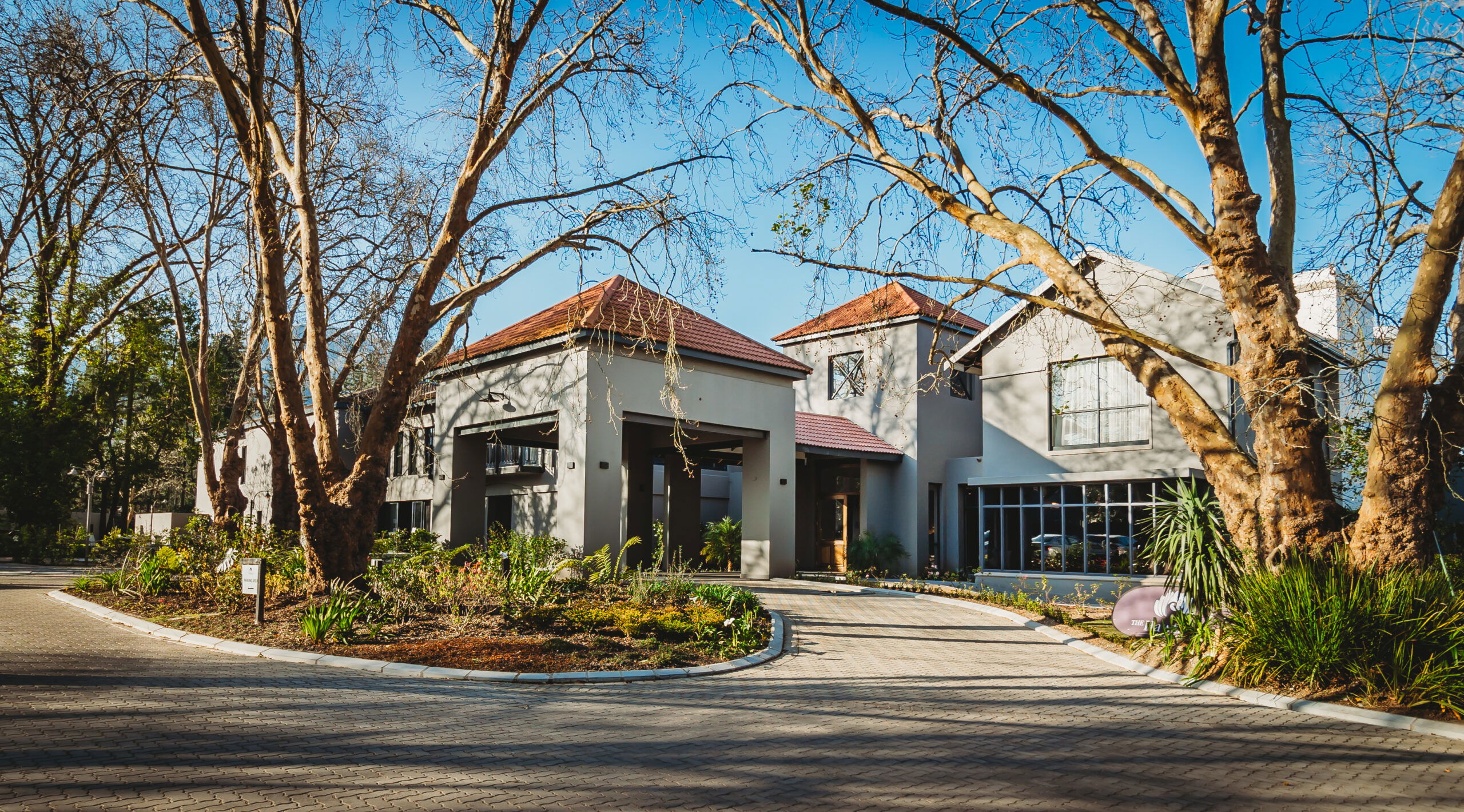 Discover the charm of Hawthorn Boutique, where historic architecture meets tranquil surroundings. Nestled among lush trees, this beautiful home offers the perfect retreat.