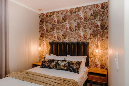 Indulge in luxury at Hawthorn Boutique, where plush bedding and elegant design create the perfect retreat. Book your stay today!
