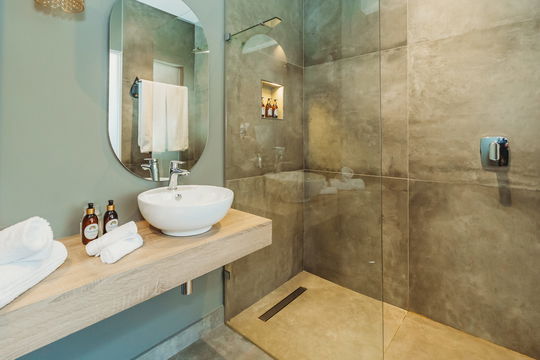 Discover the perfect balance of luxury and design at Hawthorn Boutique, with chic bathroom accessories and stunning marble finishes creating a serene oasis.