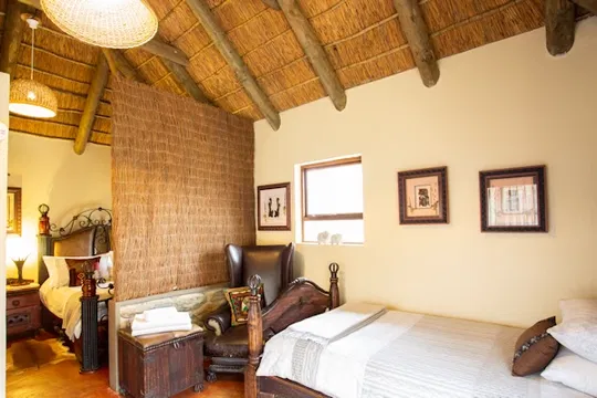 Escape to serenity at Indalu Game Reserve. Enjoy the comfort of beautifully designed accommodations, featuring cozy beds and elegant interiors that make you feel at home. Nestled in nature, it's the perfect retreat for both relaxation and adventure.