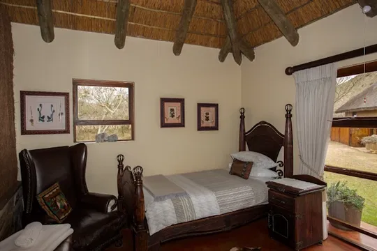 Indalu Game Reserve offers a luxurious escape where nature and comfort meet. Relax in beautifully designed bedrooms with plush bedding, perfect for recharging after an exciting day of exploration. Book your stay for an unforgettable experience.