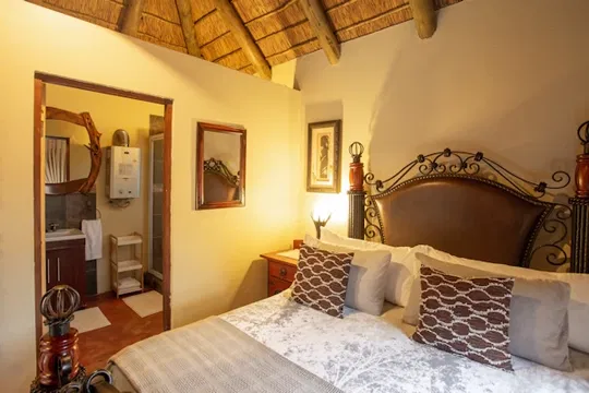 Unwind in style at Indalu Game Reserve. Our thoughtfully designed bedrooms feature plush beds, refined decor, and a calming ambiance—perfect for a restful escape after a day of adventure.