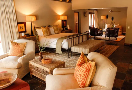 Experience the relaxed ambiance of Simbavati River Sands, where contemporary furnishings create a warm, inviting environment.