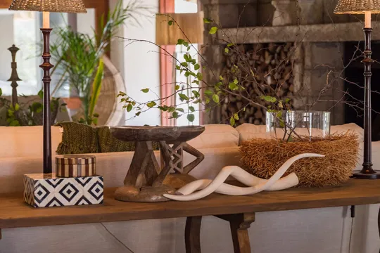 A cozy space at Simbavati River Sands, where decor and comfort create a welcoming, serene atmosphere.