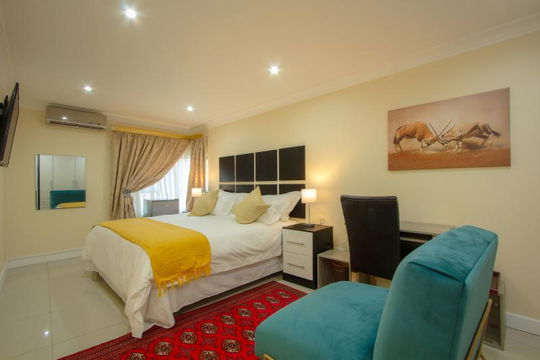 Experience ultimate comfort at Royal Hills Lodge and Spa. Our spacious rooms with plush beds and elegant design offer a perfect retreat for relaxation. Book your stay today!