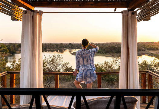 At Simbavati Hilltop Lodge, the viewing deck offers a peaceful escape, where the gentle flow of the river and the expansive sky create a serene atmosphere. It’s the perfect spot to unwind, surrounded by nature's beauty and the lodge's tranquil vibe.