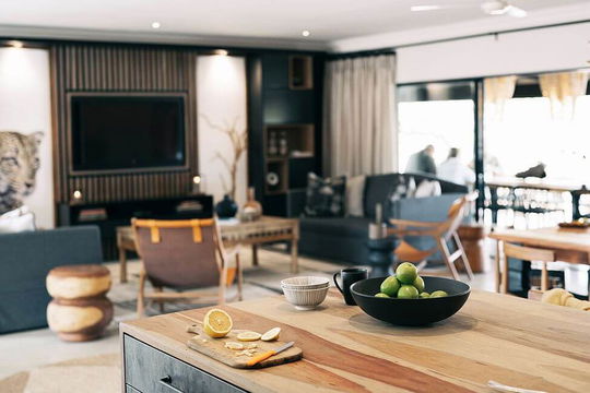 Simbavati Homestead offers a cozy living room where comfort and practicality come together, perfect for relaxation and enjoying peaceful moments.