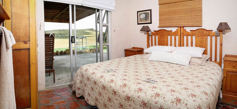 Skeiding Guest Farm offers the perfect escape, with thoughtfully designed suites featuring cozy beds and serene surroundings for total relaxation.