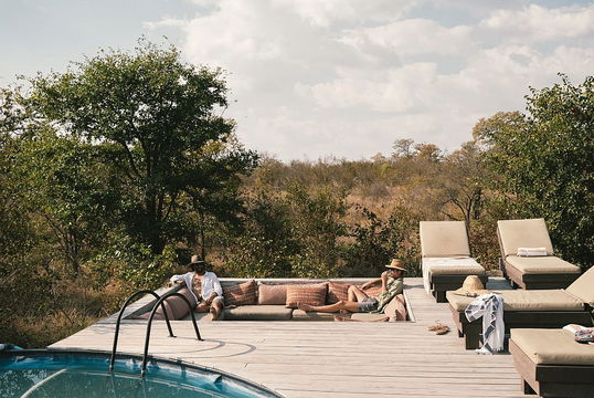 Enjoy the peaceful ambiance by the pool at Simbavati Trails Camp, where nature, relaxation, and comfort come together for an ideal retreat.