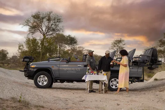 Enjoy a memorable safari experience at Simbavati Waterside, where good company and nature come together for a perfect social moment by the water.
