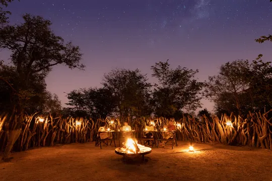 Experience the warmth of a campfire dinner at Simbavati Waterside, where nature and good company come together under the stars.