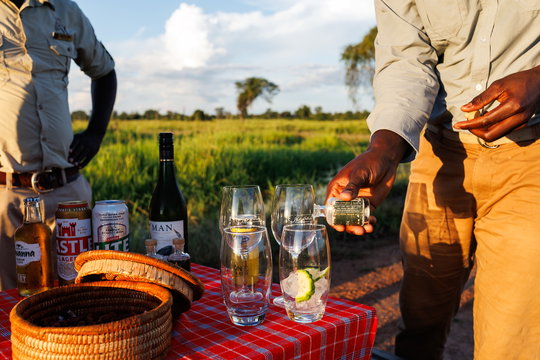 Sundowner drinks on safari at msandile river lodge