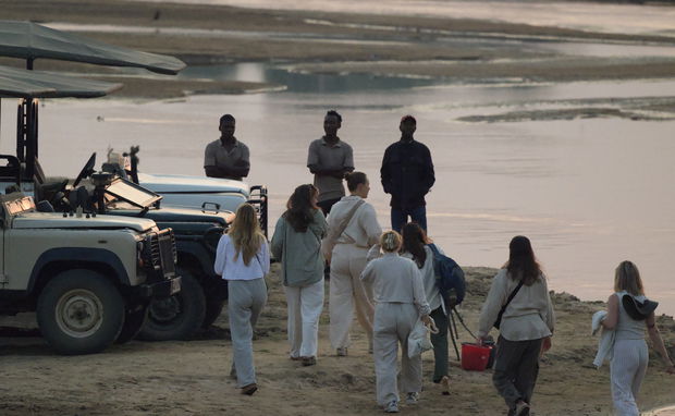 Group of girls going on safari at msandile river lodge in South Luangwa national Park. organised by Lowani Travel