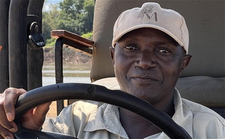 Isaac Banda, also called the professor, is head safari guide at Msandile River Lodge in South Luangwa National Park Zambia, africa