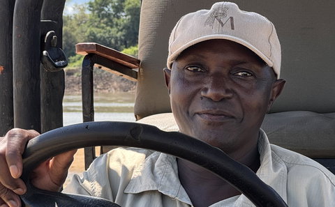 Isaac Banda, also called the professor, is head safari guide at Msandile River Lodge in South Luangwa National Park Zambia, africa