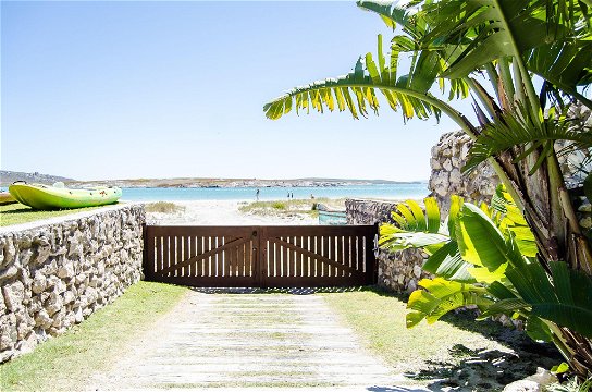 Water's Edge gate opening onto Beach Road