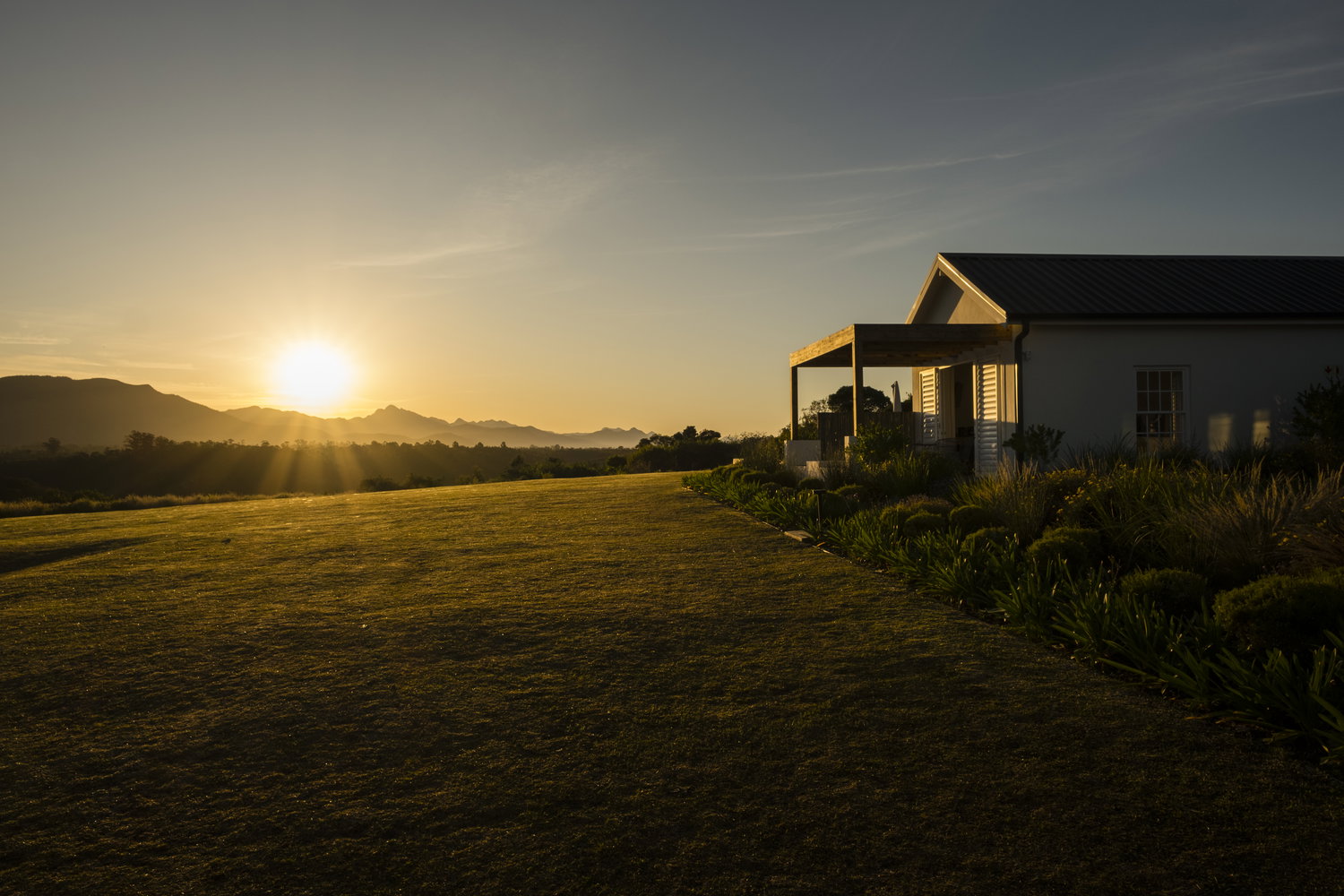 room with a view of the crags, sunrise and patio