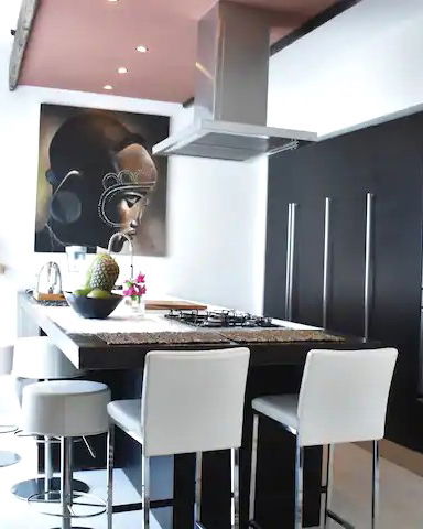 Imani Penthouse features a modern fully-equipped kitchen and has everything you need for a seamless self-catering experience.