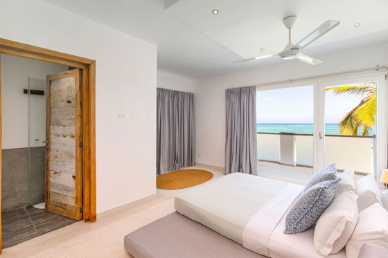 Bedroom 2 - Relax in comfort in the airconditioned bedrooms and drift off to sleep to the soothing sound of the waves.