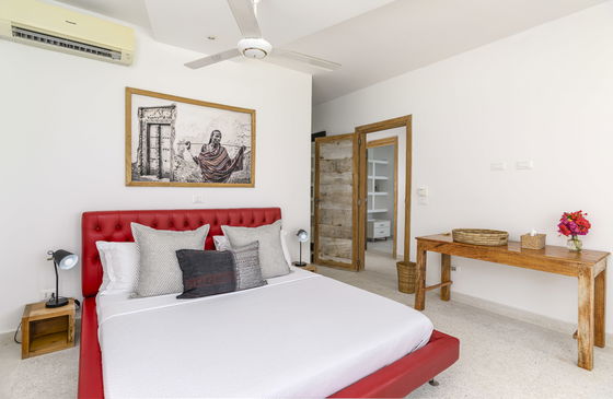 Imani Penthouse Accomodation - Both bedrooms feature large king-sized beds with overhead ceiling fans, ensuring a restful nights sleep in paradise.