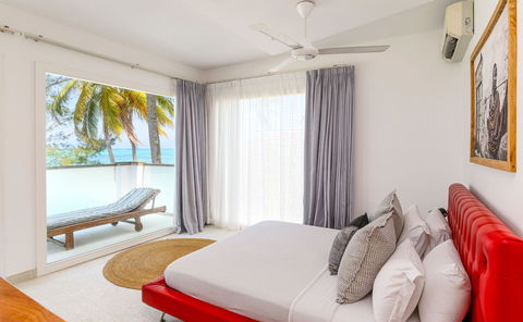 Imani Penthouse - Your Seaside Sanctuary: Nestled directly on the pristine shores of Kiwengwa Beach.