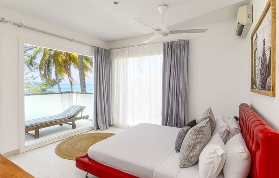 Bedroom 1 - Wake up to the soothing sounds of the Indian Ocean right at your doorstep.