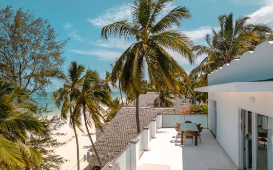 Outdoor dining area - We invite you to unwind and indulge in the ultimate island vacation at our beautiful, beachfront penthouse in Zanzibar.