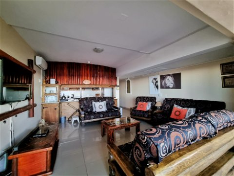 Apartment 101 is our African themed- double story 10 sleeper unit. Its downstairs balcony is closed up creating a lovely viewing station with a built-in bar and stools for your luxury.
