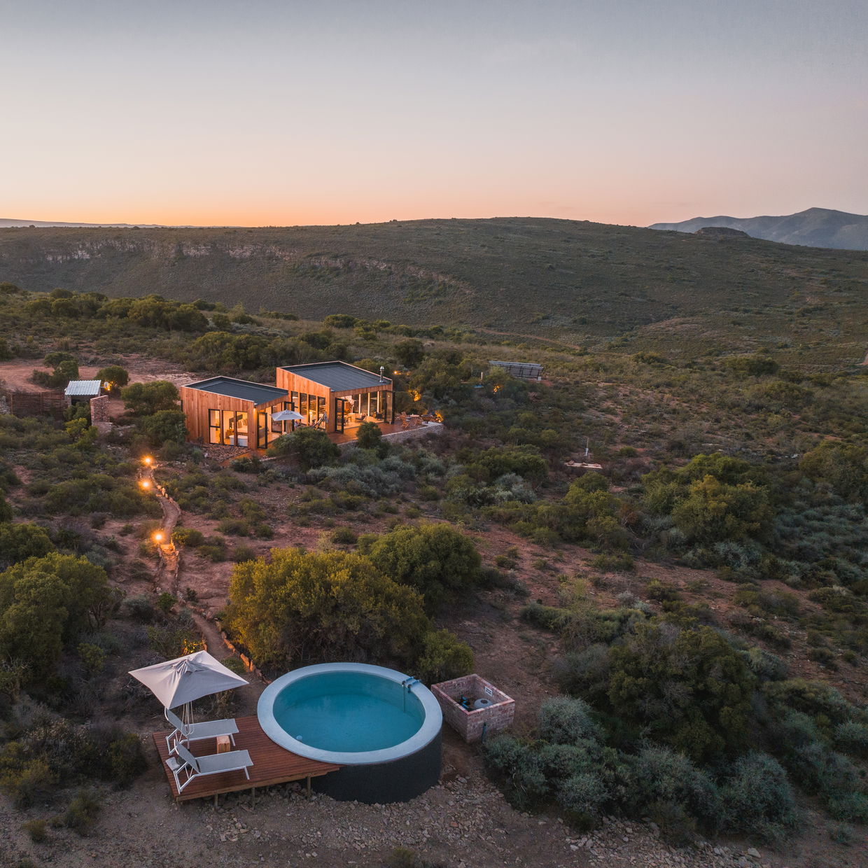 The Mountain House light up during sunset with panoramic views of the mountains