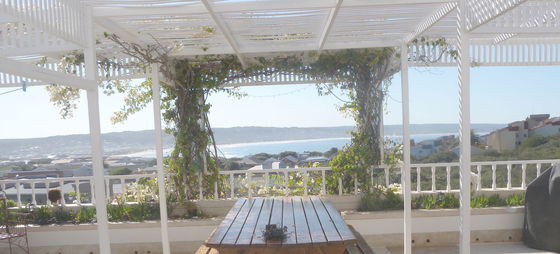 Charlotte House verandah with sea view