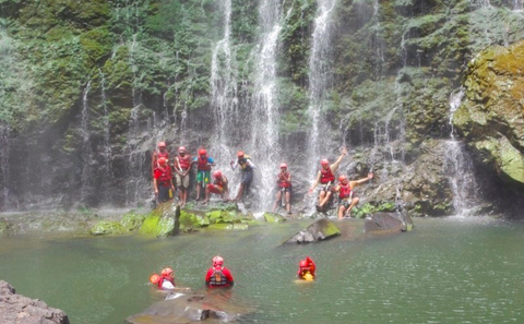 Swimming over the falls