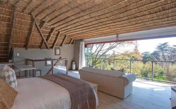 Huge delightful upstairs bedroom/study in the thatched roof loft. Ensuite bathroom