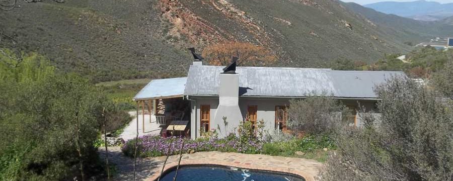 <meta name="keywords" content="Pet-friendly retreat, Cape Winelands, Robertson, Tierhoek Organic Farm, Quince Cottage, Private self-catering, Mountains, Nature, Privacy