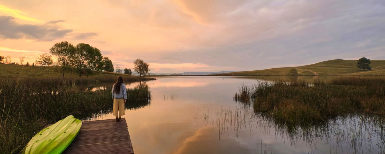 Pet-friendly accommodation in Dargle, KwaZulu-Natal Midlands. Dam-front self-catering cabin for two, small to medium dogs welcome by arrangement. Walking trails, trout dam, no resident dog interaction, ideal for calm, well-managed pets.