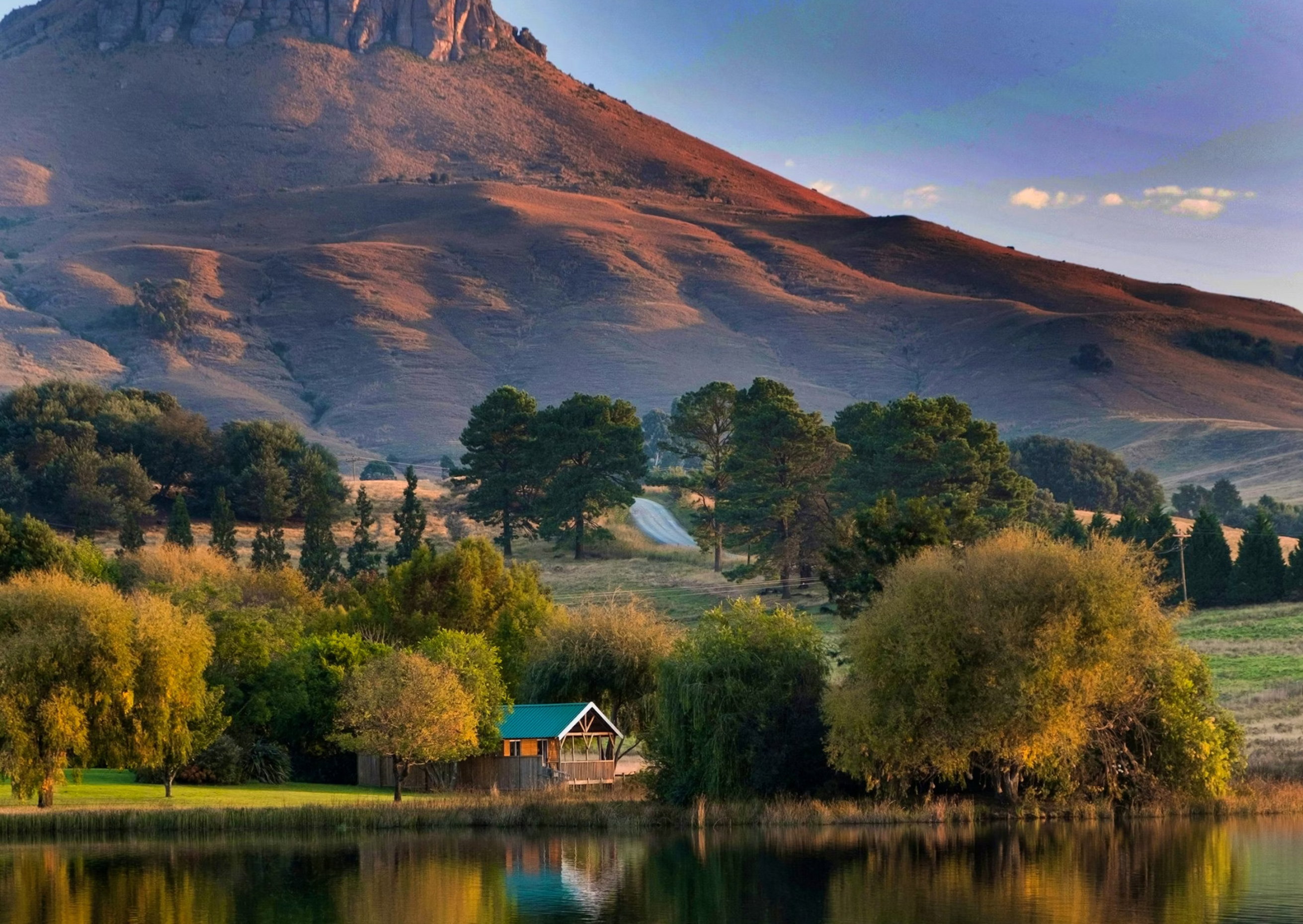 Pet-friendly accommodation in Dargle, KwaZulu-Natal Midlands. Dam-front self-catering cabin for two, small to medium dogs welcome by arrangement. Walking trails, trout dam, no resident dog interaction, ideal for calm, well-managed pets.