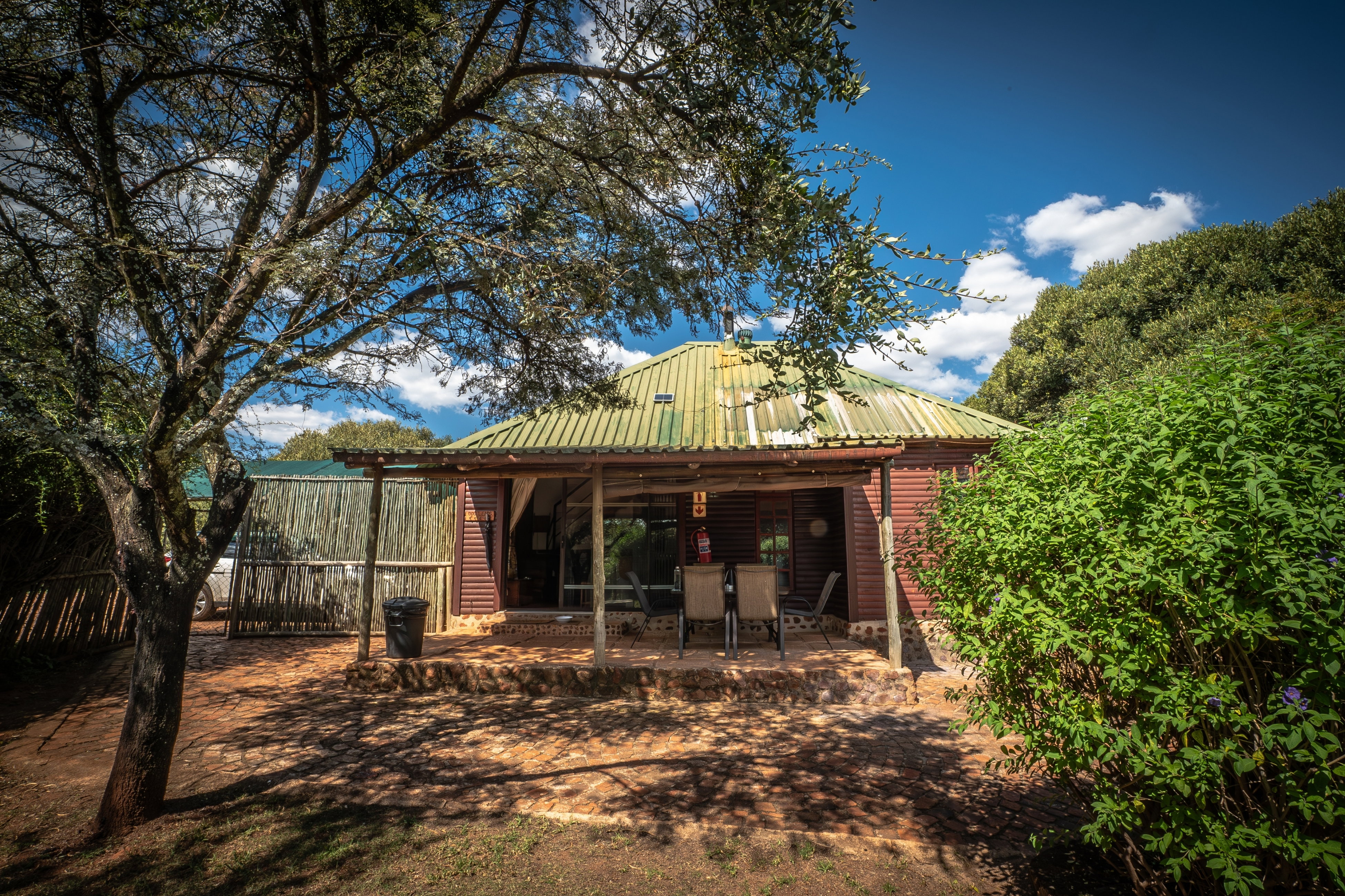 Fenced pet-friendly cottage in Magaliesburg Gauteng with private garden and off lead hiking trails.