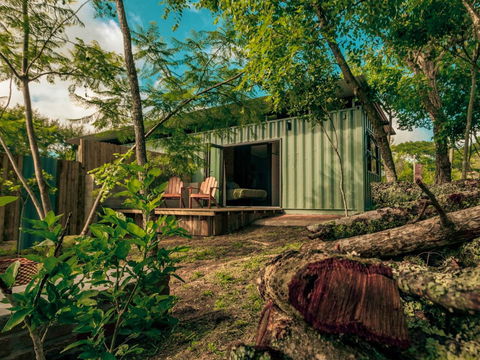 THE SHIPPING CONTAINER 