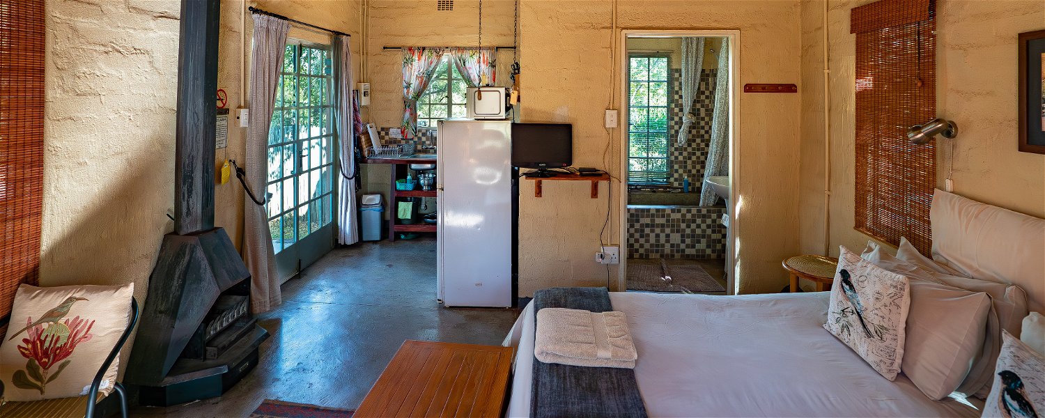 Pet friendly Fenced Self Catering Accommodation Magaliesburg Holiday Dog with Fire place