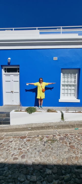 Image showing Gonana Travel guest in Bo Kaap on South African tour Image showing Gonana Travel guest in Bo Kaap on South African tour