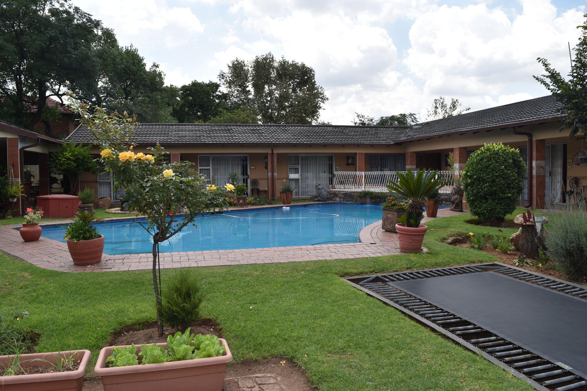 Elegant African Elephant Guest House in Germiston offering comfortable rooms, peaceful surroundings, and exceptional hospitality.