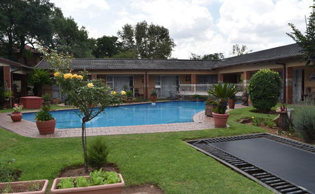 Elegant African Elephant Guest House in Germiston offering comfortable rooms, peaceful surroundings, and exceptional hospitality.
