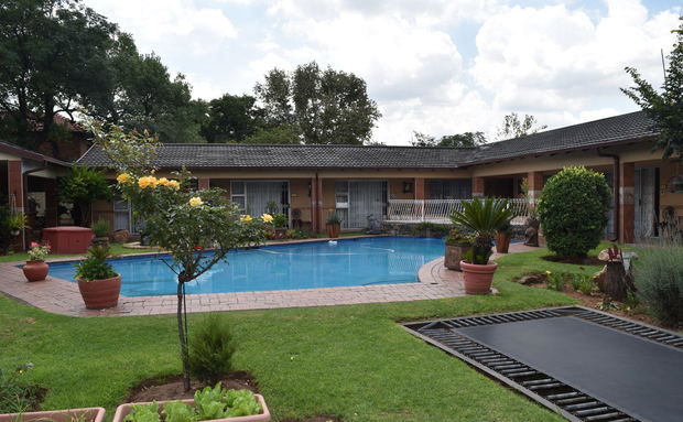 Elegant African Elephant Guest House in Germiston offering comfortable rooms, peaceful surroundings, and exceptional hospitality.