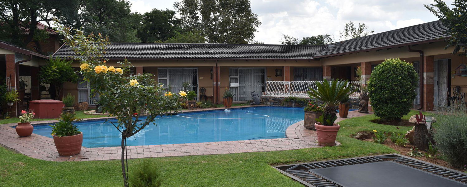 Elegant African Elephant Guest House in Germiston offering comfortable rooms, peaceful surroundings, and exceptional hospitality.